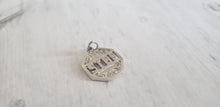 Load image into Gallery viewer, Vintage sterling silver 925 charm or pendant, I&#39;ll Never Stop Loving You slogan, in stop sign shape, sold by Gray Barn Eclectic Finds vintage store
