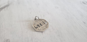 Vintage sterling silver 925 charm or pendant, I'll Never Stop Loving You slogan, in stop sign shape, sold by Gray Barn Eclectic Finds vintage store