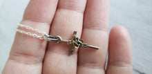 Load image into Gallery viewer, Vintage sterling silver 925 rose cross pendant and chain, Gray Barn Eclectic Finds online vintage store, held in hands to show scale and detail on front