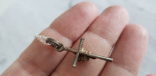 Load image into Gallery viewer, Vintage sterling silver 925 rose cross pendant and chain, Gray Barn Eclectic Finds online vintage store, held in hand to show detail on back