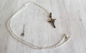 Vintage sterling silver 925 rose cross pendant and chain, Gray Barn Eclectic Finds online vintage store, cross with 18" chain on white wood table