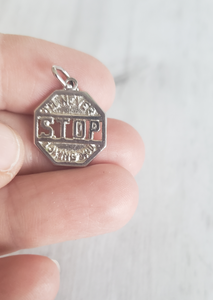 Vintage sterling silver 925 charm or pendant, I'll Never Stop Loving You slogan, in stop sign shape, sold by Gray Barn Eclectic Finds vintage store