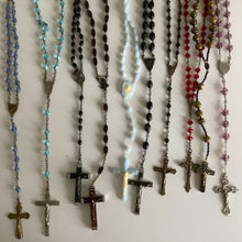 Load image into Gallery viewer, Vintage French rosaries, Gray Barn Eclectic Finds online vintage store, group of nine rosaries and chaplets photographed from overhead lying on a flat surface