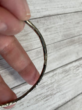 Load image into Gallery viewer, Set of three handmade round bangle bracelets in 925 sterling silver 2.75&quot; diameter (size large) with a hammered finish