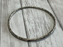 Load image into Gallery viewer, Set of three handmade round bangle bracelets in 925 sterling silver 2.75&quot; diameter (size large) with a hammered finish