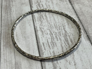 Set of three handmade round bangle bracelets in 925 sterling silver 2.75" diameter (size large) with a hammered finish
