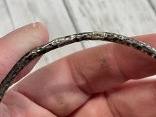 Load image into Gallery viewer, Set of three handmade round bangle bracelets in 925 sterling silver 2.75&quot; diameter (size large) with a hammered finish