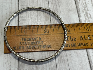 Set of three handmade round bangle bracelets in 925 sterling silver 2.75" diameter (size large) with a hammered finish