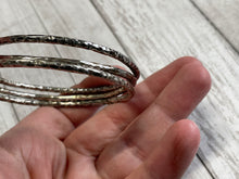 Load image into Gallery viewer, Set of three handmade round bangle bracelets in 925 sterling silver 2.75&quot; diameter (size large) with a hammered finish