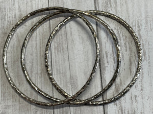 Set of three handmade round bangle bracelets in 925 sterling silver 2.75" diameter (size large) with a hammered finish