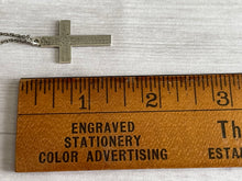 Load image into Gallery viewer, vintage silver cross lengthwise next to a wooden ruler, showing length as approximately 1.25 inches