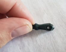 Load image into Gallery viewer, Victorian or Edwardian antique green bloodstone carved fist charm with crystal magnifier inset in clenched hand, Gray Barn Eclectic Finds online vintage store, held on side to show crystal facets