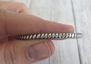 Vintage Sterling Silver 925 boho wide single bangle bracelet, Gray Barn Eclectic Finds online vintage store, bracelet held sideways in hand