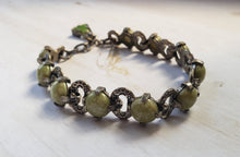 Load image into Gallery viewer, Estate Costume Scottish Miracle Glass and Silver Tone Bracelet - vintage costume jewelry, 1960s, scottish bracelet, mid century, avocado