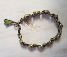 Load image into Gallery viewer, Estate Costume Scottish Miracle Glass and Silver Tone Bracelet - vintage costume jewelry, 1960s, scottish bracelet, mid century, avocado